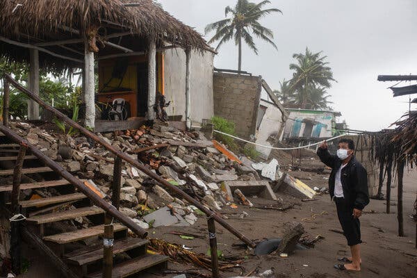 A man inspecting his damaged home in Tecolutla, on Mexico’s Gulf Coast, after Hurricane Grace made landfall on Saturday.