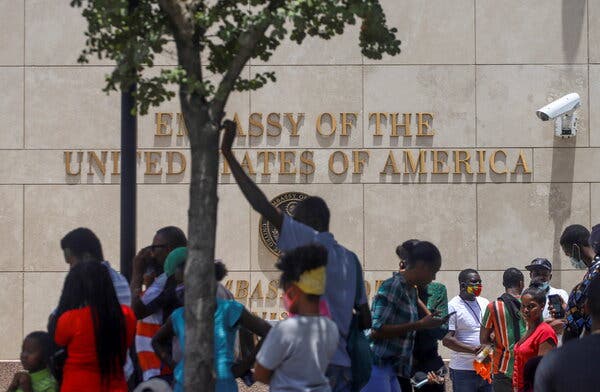 Haitians gathered outside the U.S. Embassy in Port-au-Prince on Friday, hoping to be granted visas to leave the country.