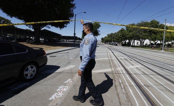 Investigators at the scene of a workplace shooting at the San Jose Valley Transportation Authority’s light rail yard in San Jose.
