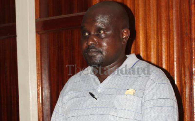 Officer denies killing lawyer and his client