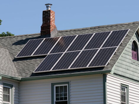 File photo of solar panels installed on top of house