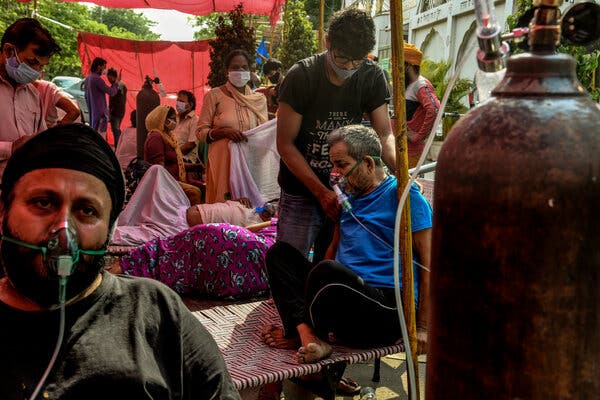 People receiving oxygen in Delhi last month.