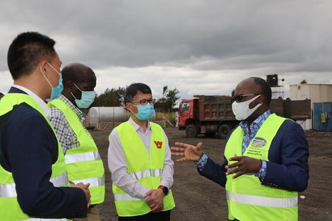 Transport Cabinet Secretary James Macharia with contractors of the Kenol-Marua dual carriageway, July 2020.