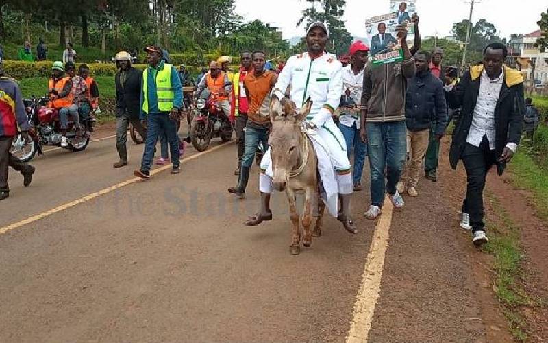 Nyamira Senate aspirant rides on donkey to seek IEBC clearance