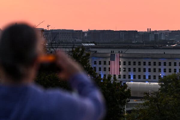 The United States Flag was unfurled from the roof of the Pentagon early on Saturday.