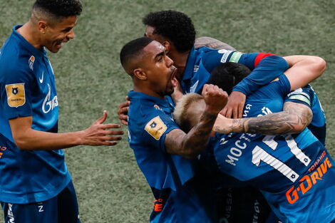 Malcom (C) of Zenit Saint Petersburg celebrates a goal with teammates during the Russian Premier League match between FC Zenit Saint Petersburg and FC Rotor Volgograd on April 24, 2021 