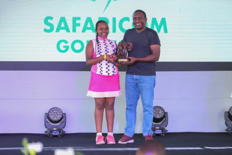 From Left Junior Golfer Belinda Wanjiru receives an award from Jackson Mutua, Regional Head of Sales & Operations, Safaricom PLC, for the best girl of the Safaricom Golf Tour at Nanyuki Sports Club - Bizna Kenya