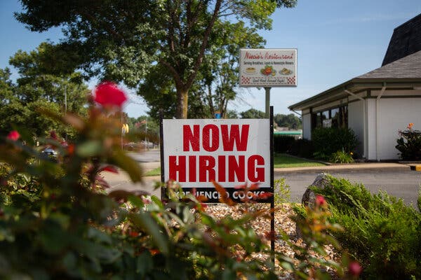 A restaurant in Kansas City, Mo., was looking for help this week. While there has been some pickup in hiring in service industries, many companies are still not bringing back workers.