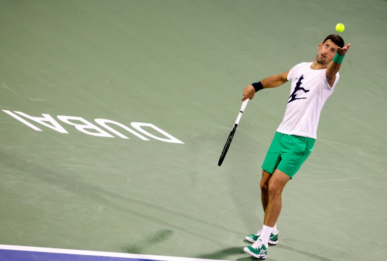 Djokovic gets season underway to loud cheers in Dubai