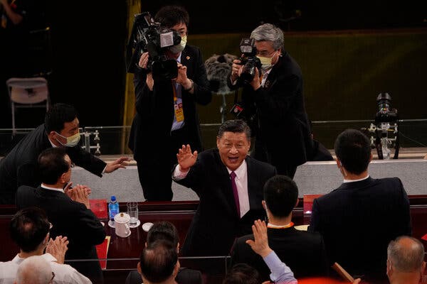 Xi Jinping, China’s leader, center, is the country’s most powerful leader since Deng or Mao.