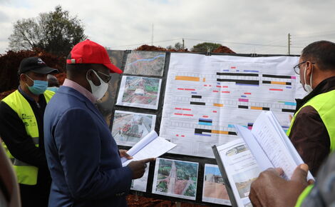 Transport Cabinet Secretary James Macharia (Red Cap) inspecting construction of the James Gichuru Jn - Rironi Road in August 2020.