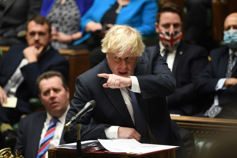 UK's Johnson faces angry MPs at vote on new virus curbs » Capital News