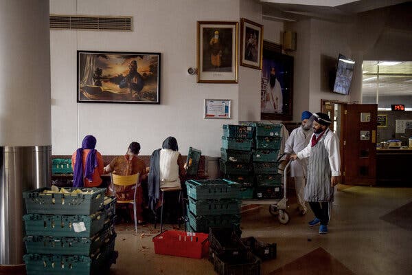 Members of the Indian diaspora community prepared food in the Gurdwara Sri Guru Singh Sabha in Southall, West London, this week.