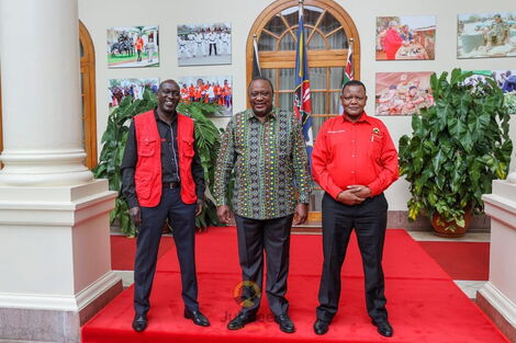 From left; Jubilee party Kiambaa MP candidate Kariri Njama, President Uhuru Kenyatta and Muguga ward MCA aspirant Githinji Mungara