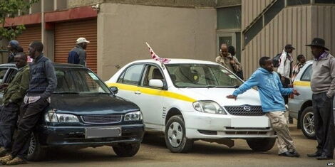 Taxi drivers at a parking lot in Nairobi
