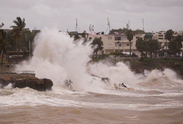 Intense waves during the passage of tropical storm Elsa in Santo Domingo, Dominican Republic, on Saturday.