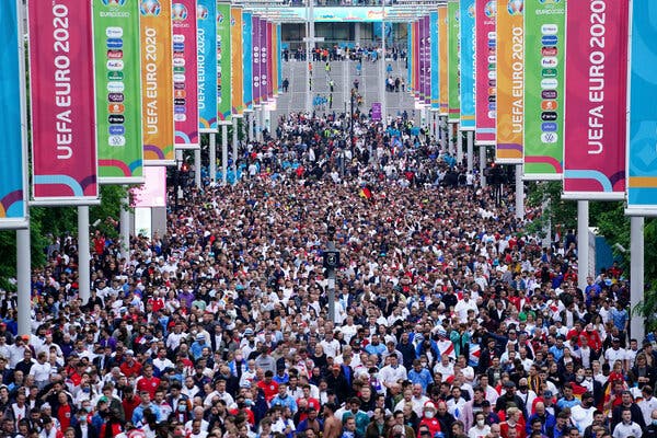 Fans leaving Wembley Stadium in London on Tuesday after a match between England and Germany on Tuesday.