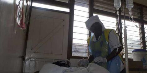 A nurse attends to a cholera patient at a hospital in Kisumu in 2018