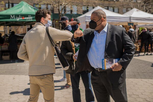 Alvin Bragg, right, candidate for district attorney of Manhattan, greeting volunteers at Union Square in early May.