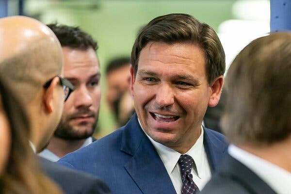 Gov. Ron DeSantis of Florida signed new voting restrictions into law on Thursday that will make it more difficult for people to vote by mail and use ballot drop boxes.
