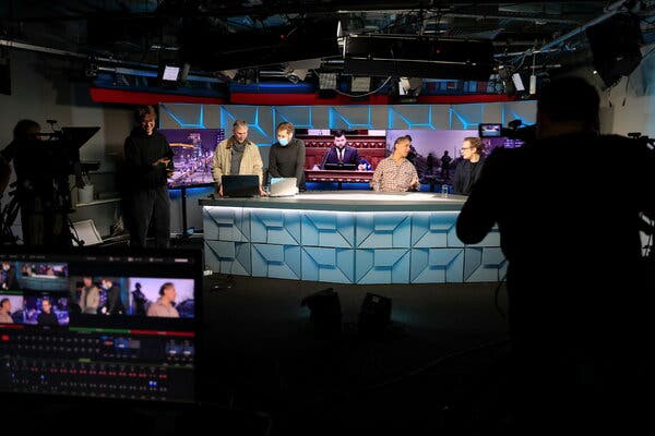 Journalists work in the studio of Radio Free Europe/Radio Liberty in Moscow, Russia in April, 2021.