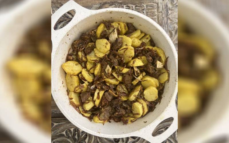 Beef with lyonnaise potatoes Eve woman
