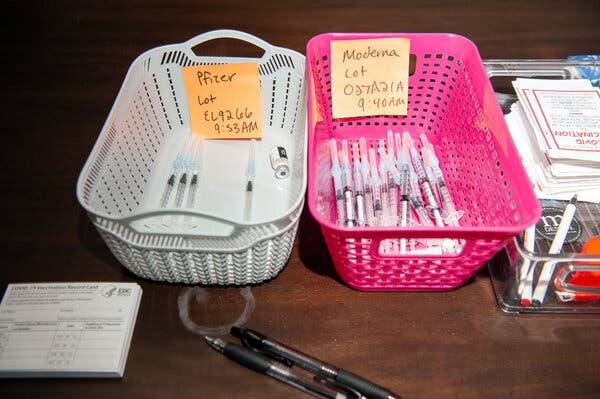 Prepped Pfizer and Moderna vaccines at a pharmacy in Little Rock, Ark., in March.