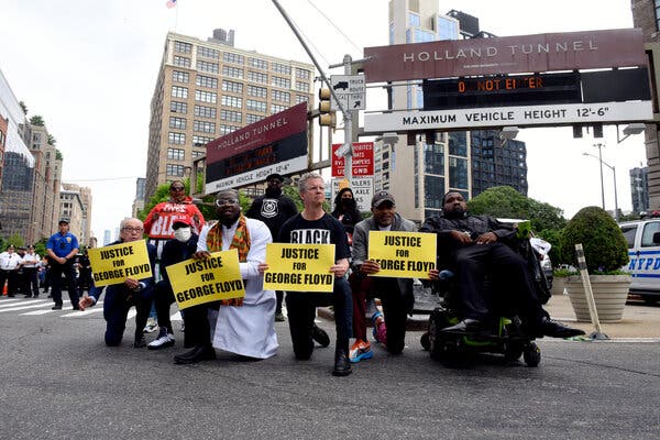 A small group of Black Lives Matter demonstrators in Manhattan blocked traffic through the Holland Tunnel on the one-year anniversary of George Floyd’s death.