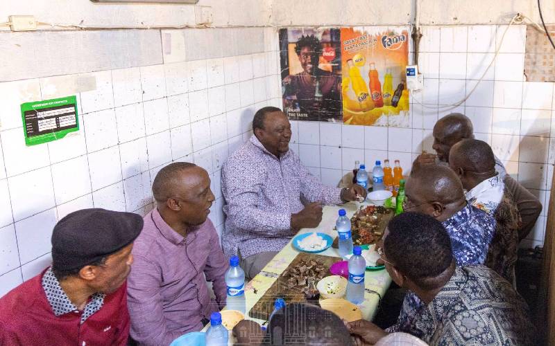 President Uhuru Kenyatta drives himself during Nairobi inspection tour