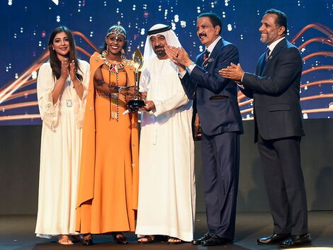 Sheikh Ahmed bin Saeed Al Maktoum, chairman of Emirates presents the first-ever Aster Guardian Global Nursing award to Kenyan nurse Anna Qabale Duba on Thursday, May 12.