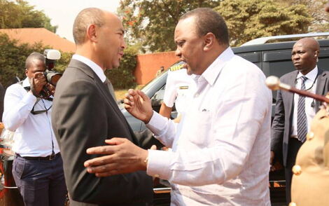 An image of Uhuru and Peter Kenneth