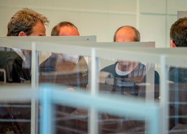 Anwar Raslan, second from right, at a court hearing in Koblenz, Germany, in 2020. German courts do not allow the news media to show the faces of defendants.
