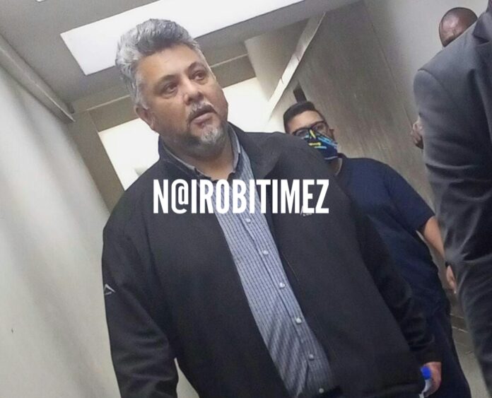 BUSINESSMAN DENIES HALF A BILLION FRAUD CHARGE IN FALSE SECURITY DEPOSITED IN A BANK.