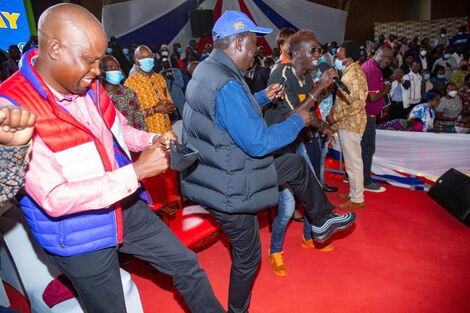 ODM leader Raila Odinga dancing alongside Kieni MP Kanini Kega and a local artist during his birthday party at the Bomas of Kenya , Nairobi on Friday January 7, 2022
