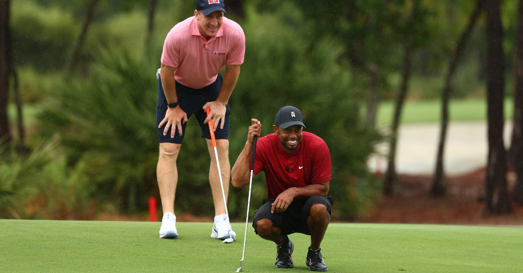 Tiger Woods-Peyton Manning pairing wins match over Phil Mickelson-Tom Brady