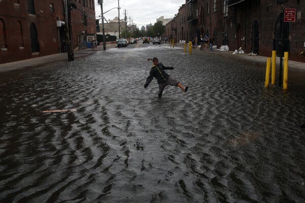 Flooded streets in Brooklyn from rain dropped by Hurricane Irene in 2011.