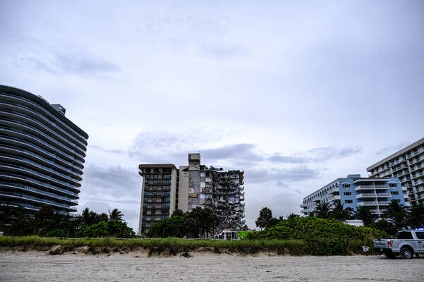 The partially collapsed condominium complex.