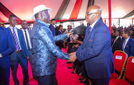 ODM leader Raila Odinga greets Jimmy Kibaki during the late President Mwai Kibaki's burial in Othaya on Saturday, April 30, 2022.