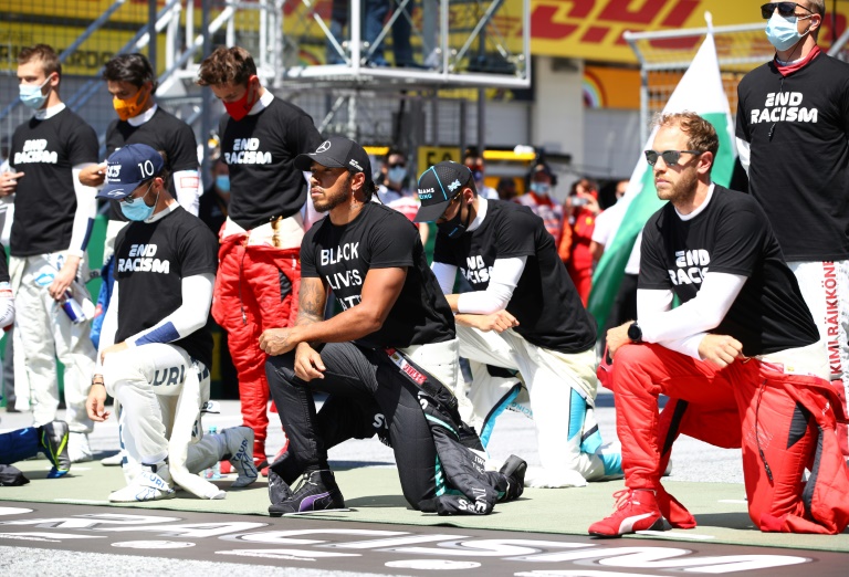 'It's about equality, not politics,' says Hamilton as six drivers refuse to take knee