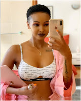 HUDDAH flosses NAKED buttocks and firm BOOBs in new juicy PHOTOs.