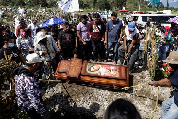 Relatives attended a funeral for a man who died from the coronavirus in Valle de Chalco, Mexico, last month.