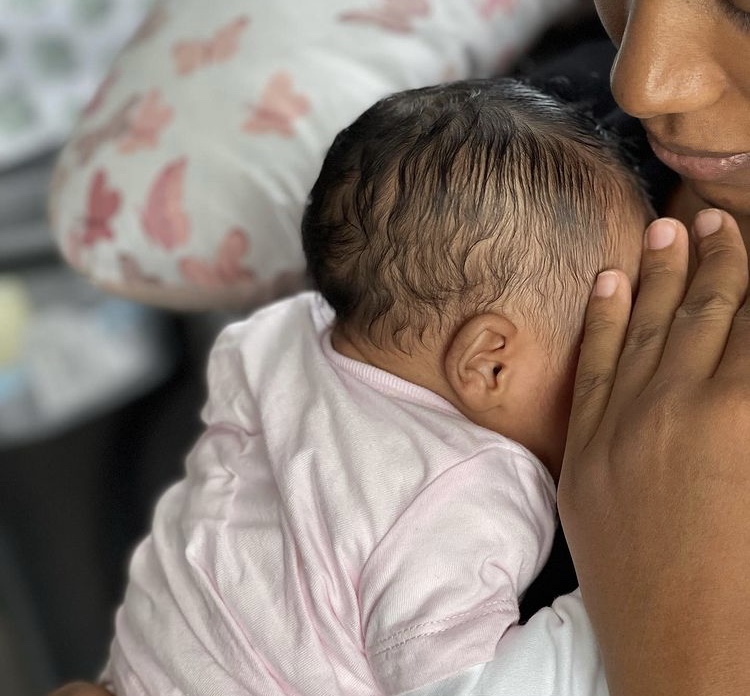 Grace Ekirapa responds to netizens worried about her keeping a dog around newborn daughter