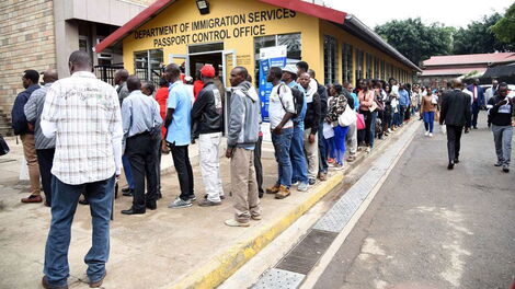 People queue for passports outside the Nyayo House headquarters in Nairobi.
