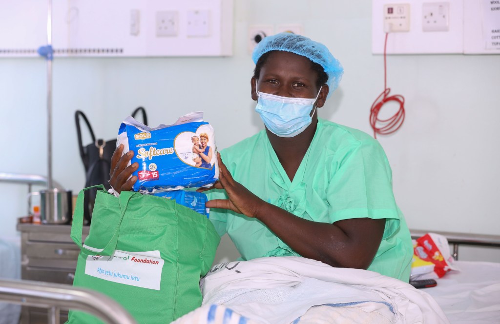 Joy Kamau, a new mother after receiving a Mama Pack during Safaricom Foundation’s handover of a Maternal HDU and Newborn unit in KNH Othaya, Nyeri County - Bizna Kenya