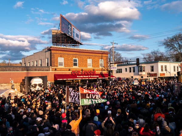 People descended upon the memorial at George Floyd Square in Minneapolis to celebrate the guilty verdict in the Derek Chauvin trial in April. The Justice Department has announced it will charge Mr. Chauvin and three other officers with violating Mr. Floyd’s civil rights.