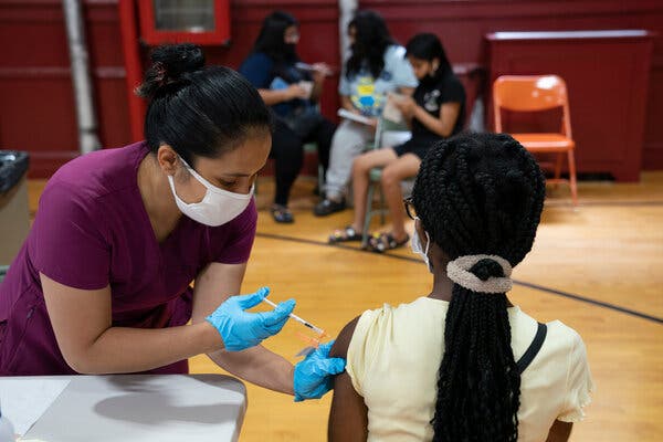Pfizer vaccines were administered at the St. John Chrysostom Catholic Parish in The Bronx on Sunday.