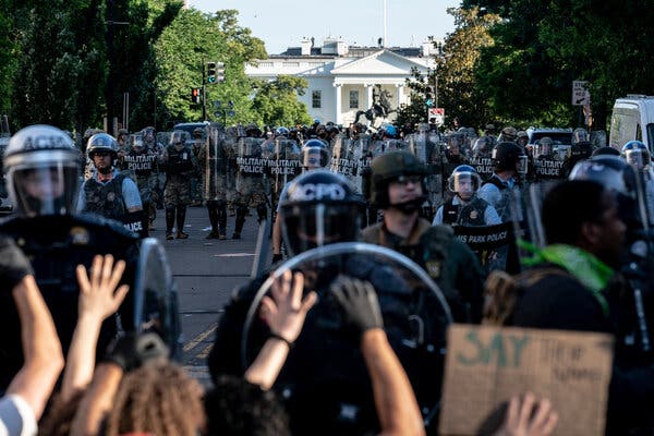 Police officers advancing on protesters outside the White House last June.