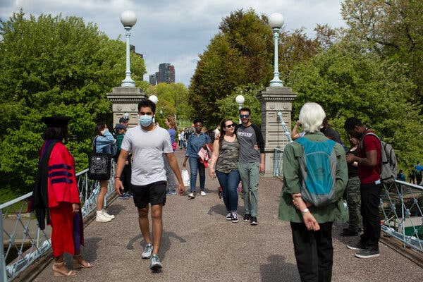 Last week in the Public Gardens in Boston, some people wore masks, others did not.