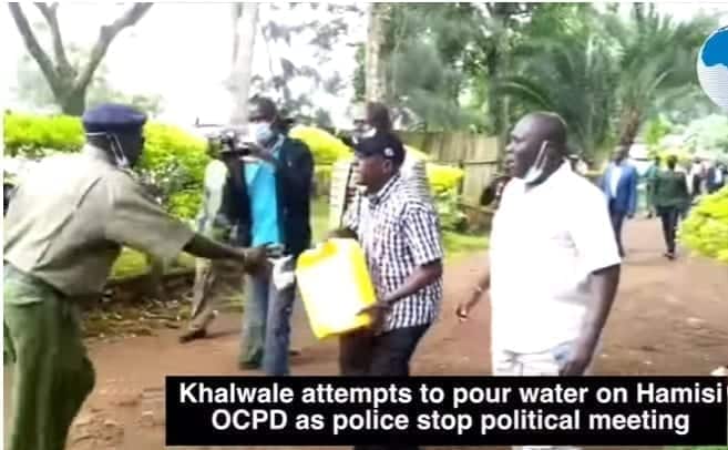 Drama as Khalwale Washes Police Boss With Bucket of Water