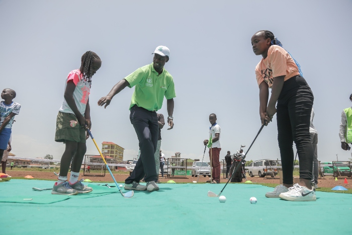 Youth in Kisumu engaged in a Safaricom golf outreach programme ‘Golf Mtaani’
